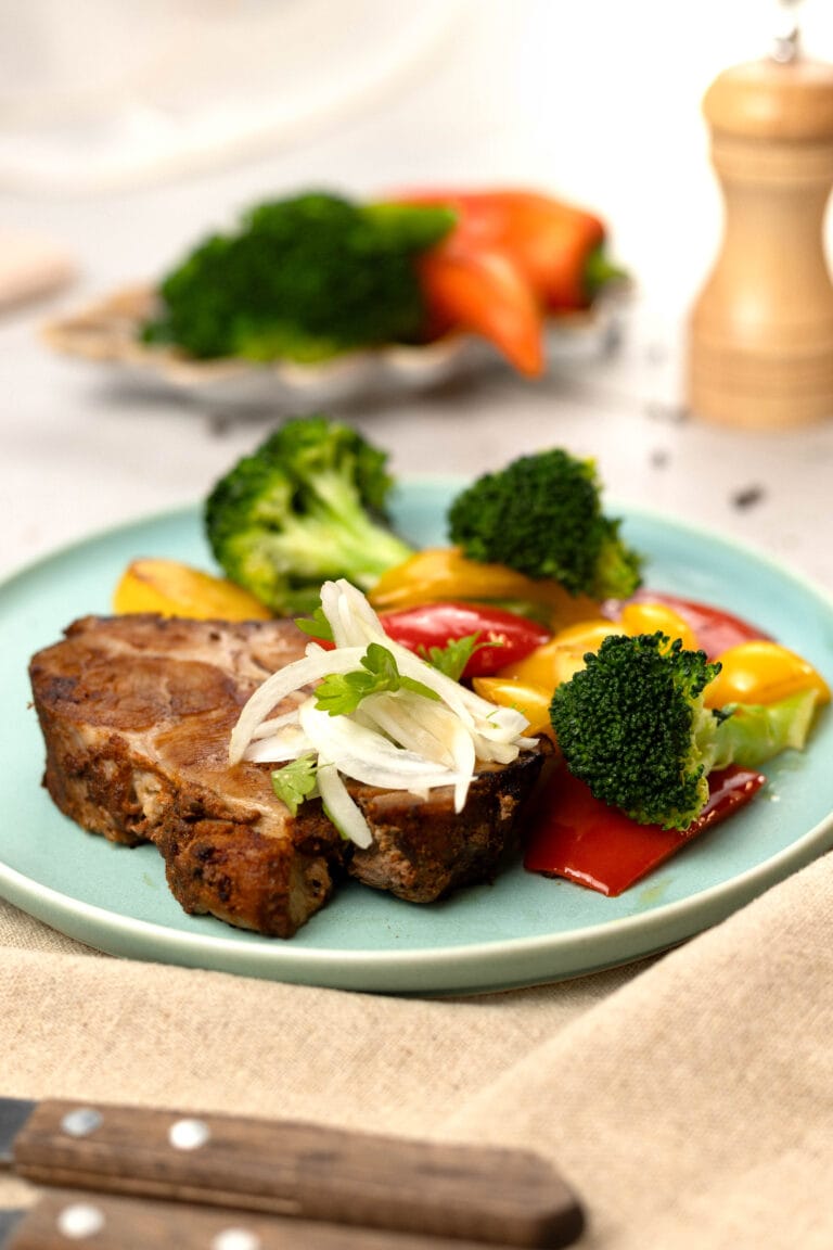 Pork neck with grilled vegetables and potatoes