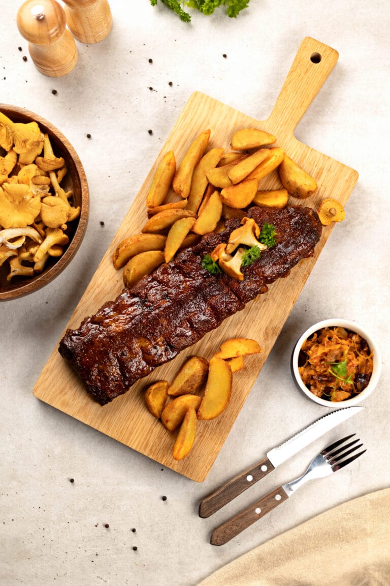 ribs with bigos + potato wedges